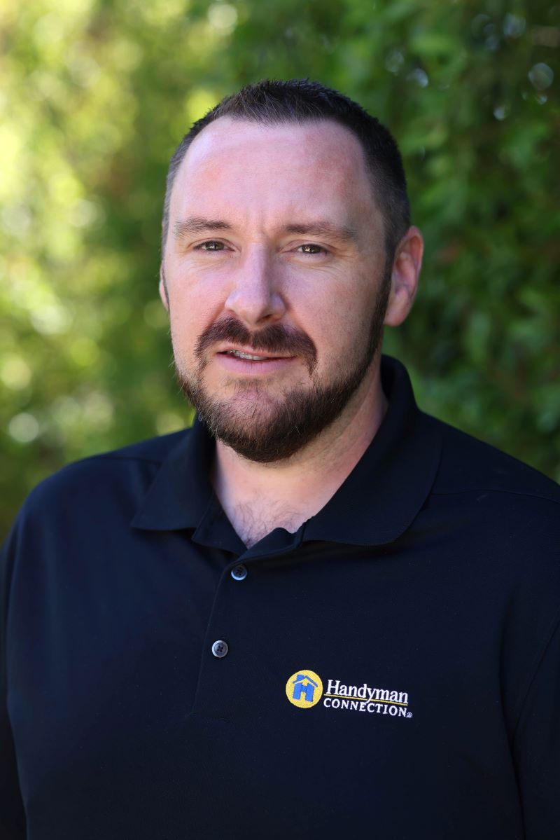 Picture of a man Steve Lane wearing a black shirt.